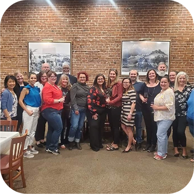 Lucy Escobar at BNI Reunion group photo